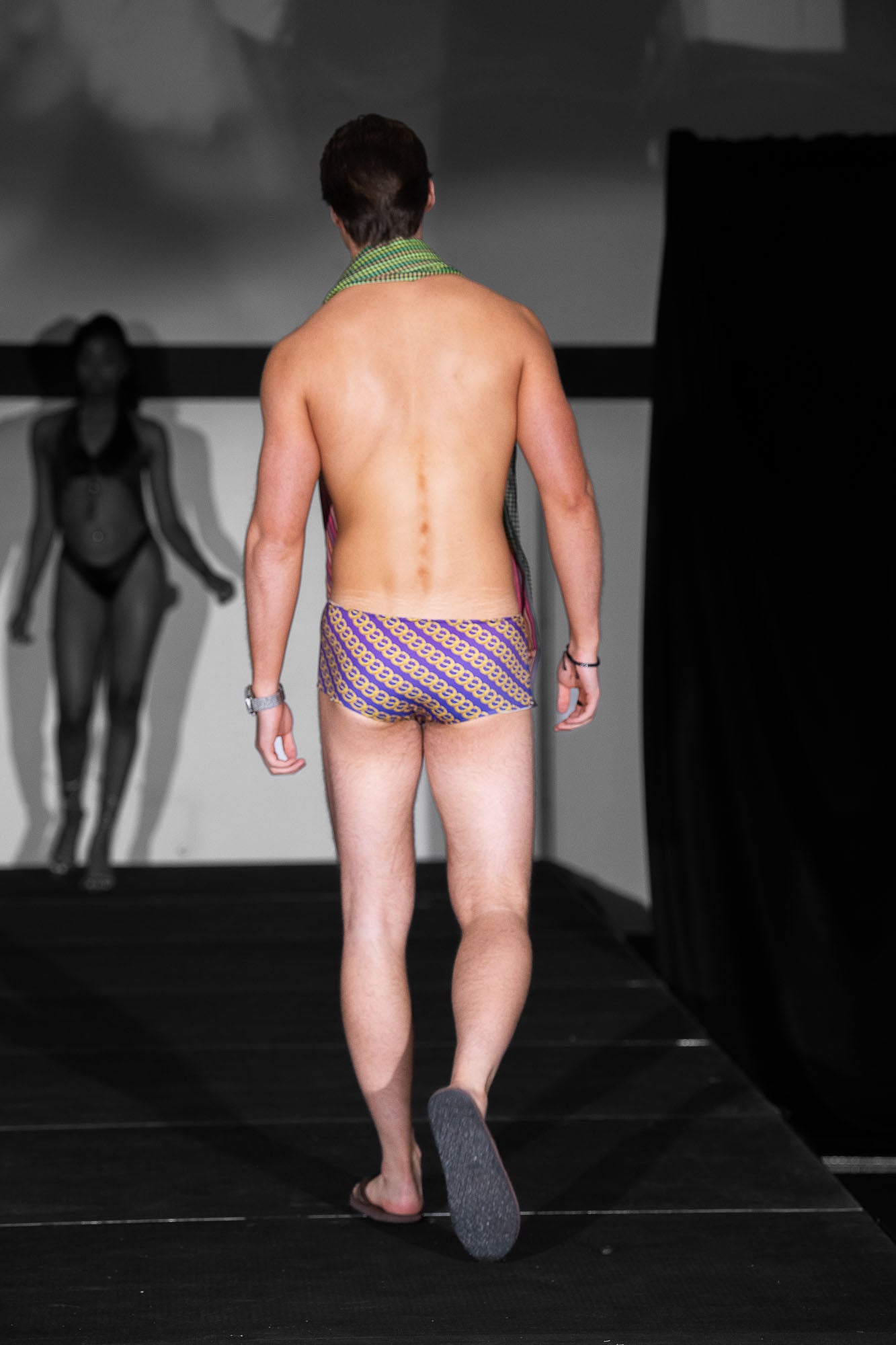 mens blue swim trunks back