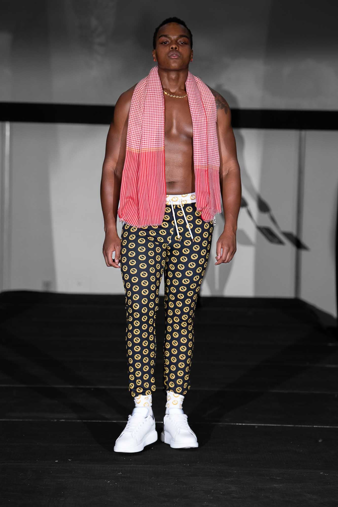 mens black and yellow pants