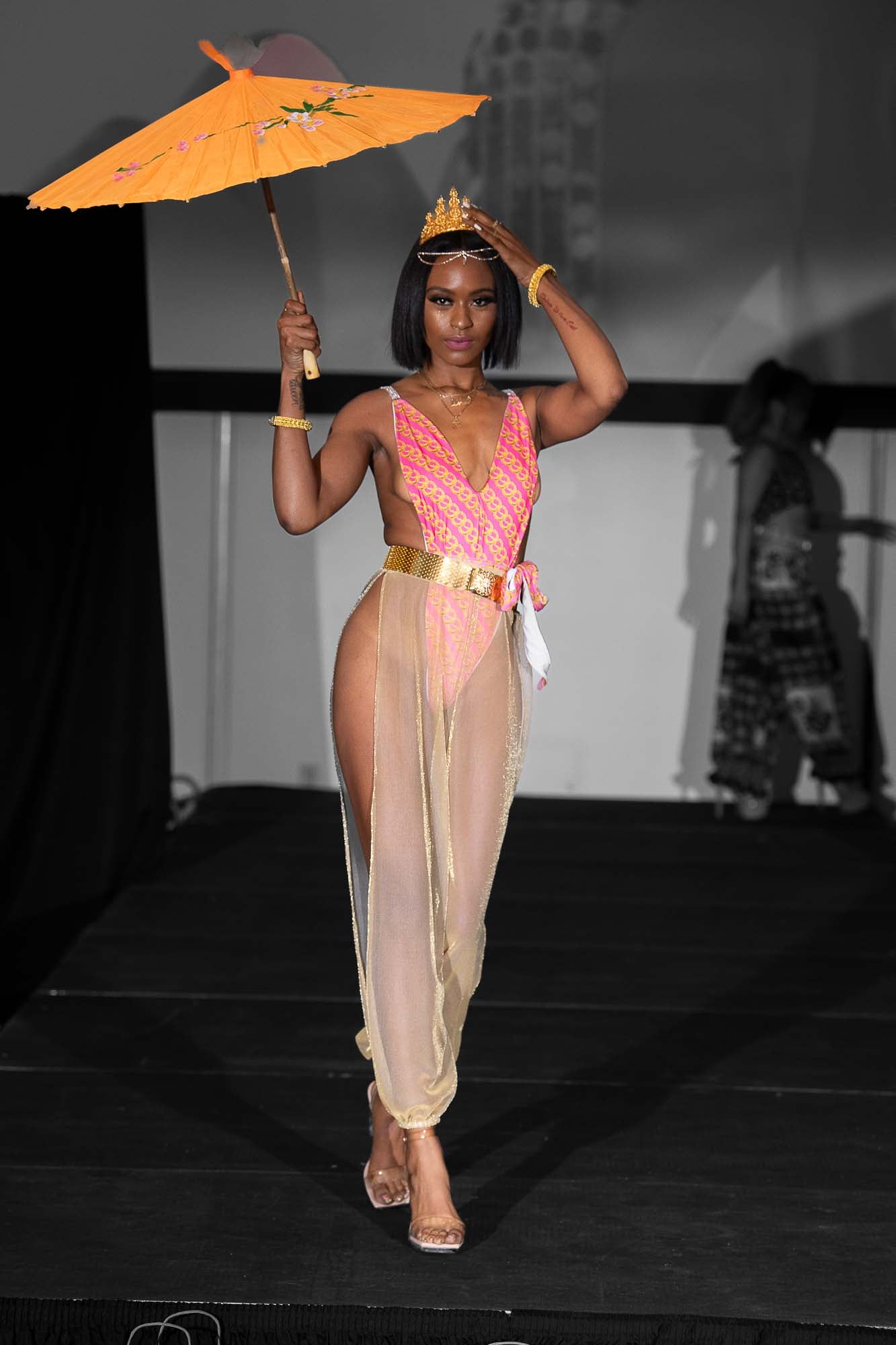 pink one piece body suit with coverup
