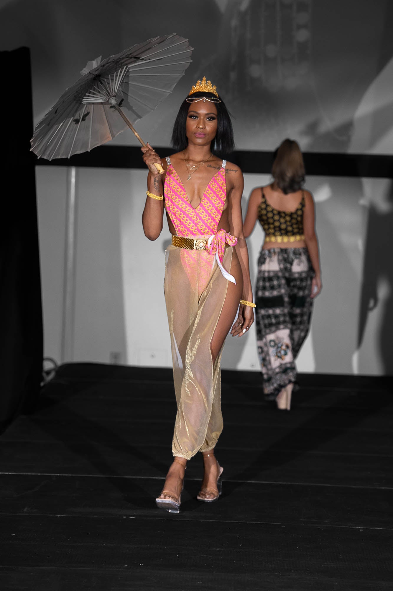 pink one piece body suit with coverup