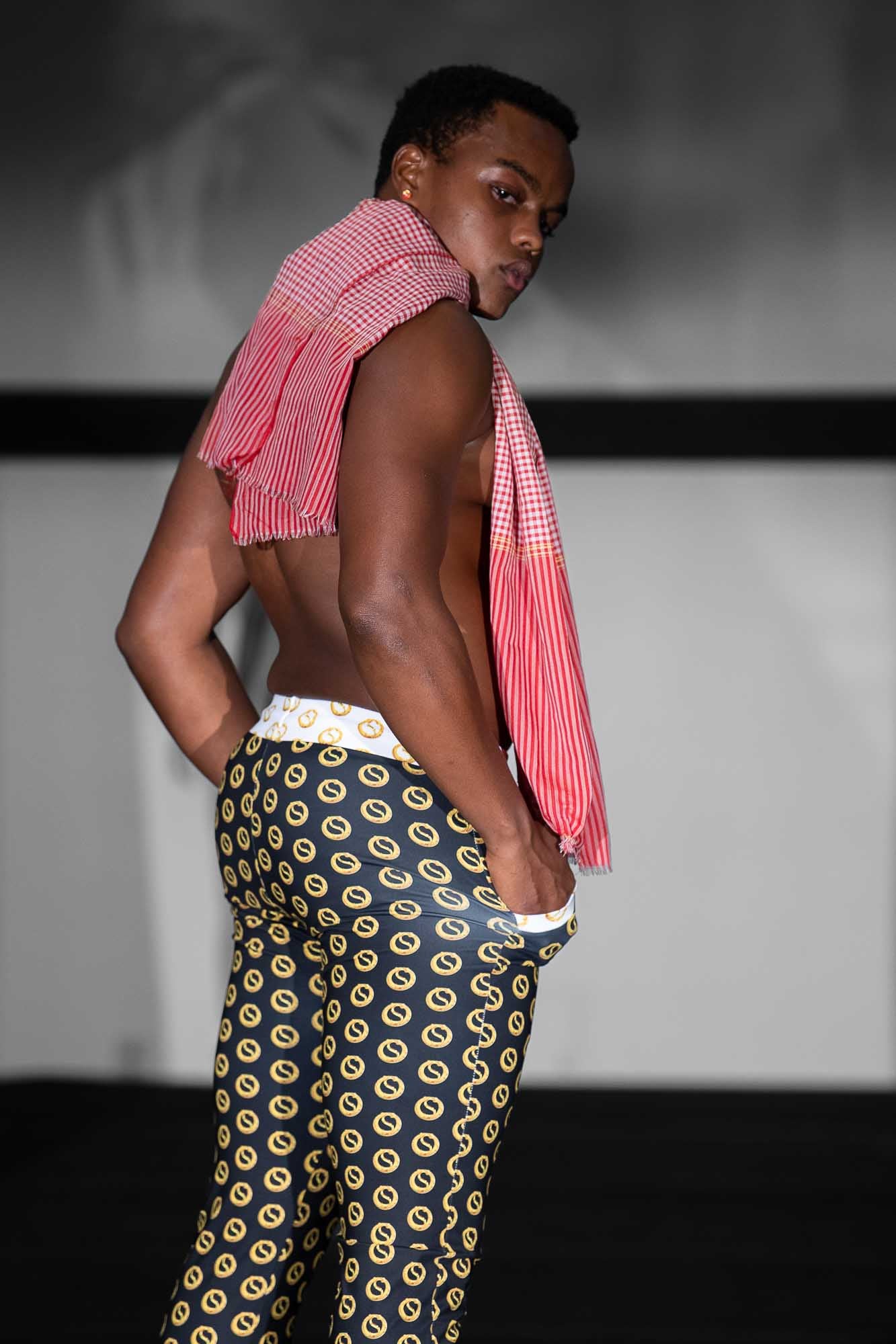 mens black and yellow pants